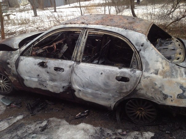 Проспект Мира в Донецке после обстрела: выбитые стекла и сгоревшие автомобили