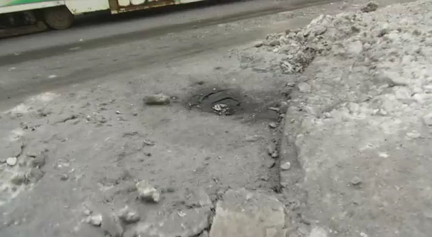 Последствия обстрела ул. П. Поповича в Донецке: разбитое кафе и СТО, оборванные провода