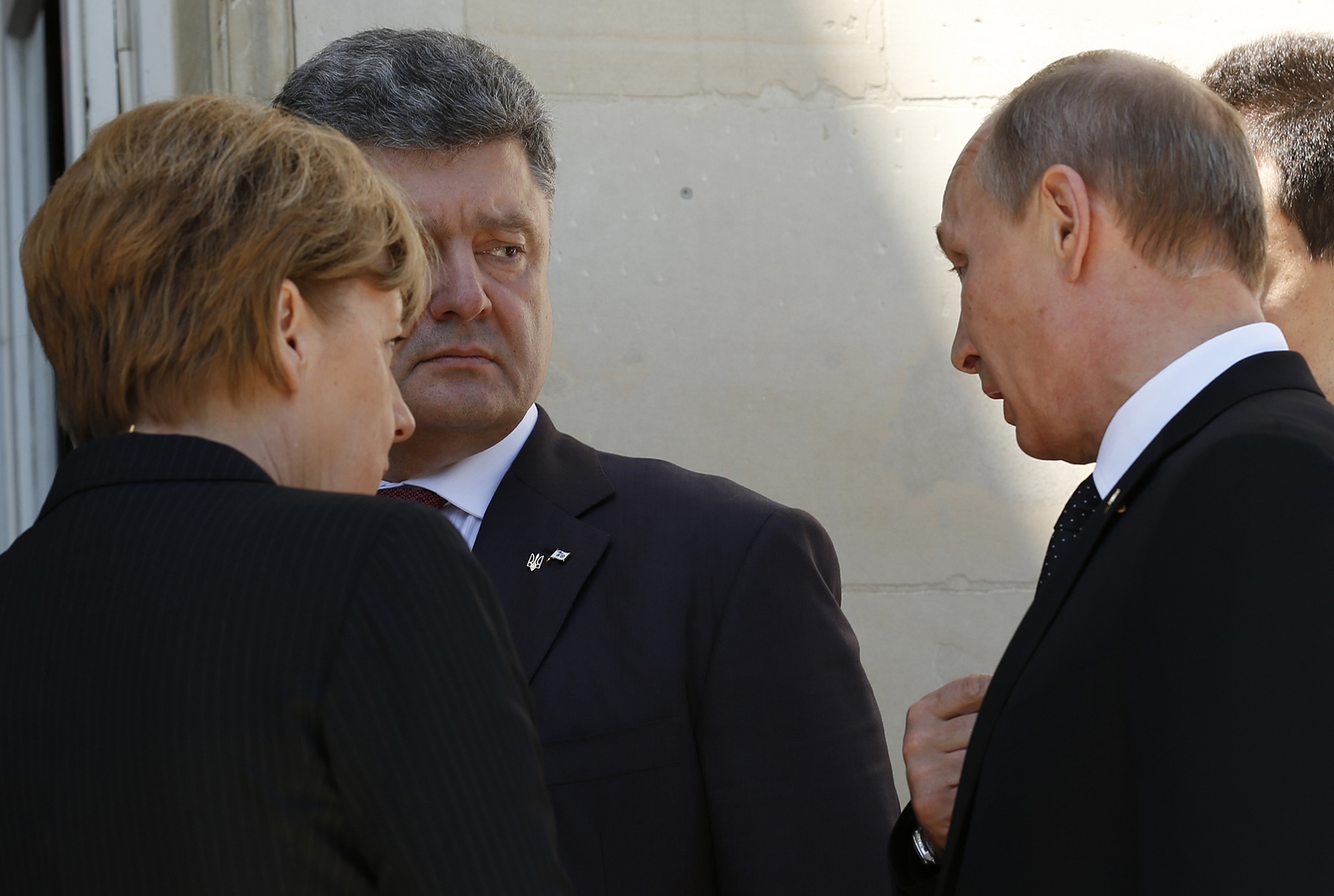 Путин, Меркель и Порошенко обсудили реализацию минских соглашений