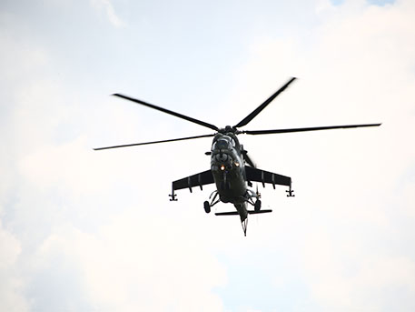 Москва в первый раз признала, что на боевых машинах под флагом Сирии летают российские военные