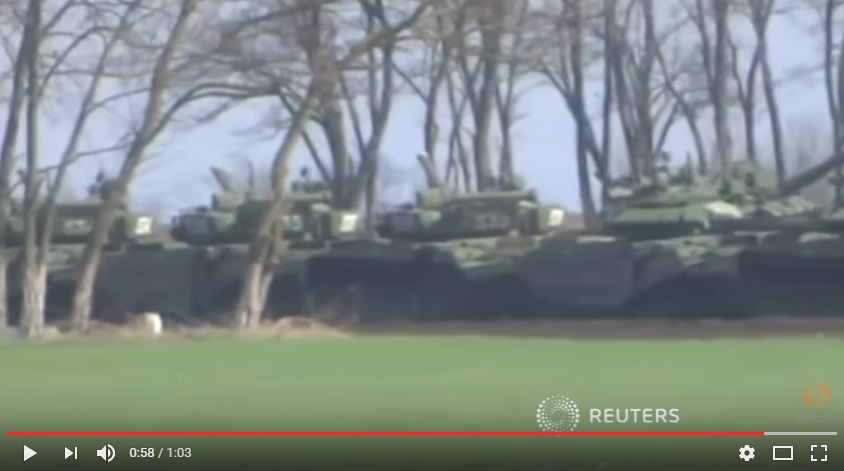 Путин хочет очередного этапа войны с Украиной: Reuters показало сенсационное видео, к украинской границе переброшены десятки танков, солдаты РФ разгружают боеприпасы