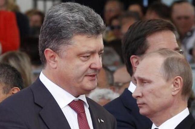  СМИ: Порошенко и Путин договорились об окончании АТО 
