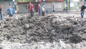 Последствия удара по автостанции в макеевском поселке Ханженково 12.09.2014