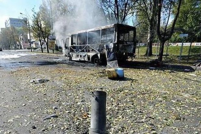 Главное за день 1 октября: в Донецке обстреляли школы, захоронения в Нижней Крынке и расследование Иловайского котла
