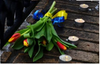 На место убийства Немцова Теффт возложил букет с желто-синей ленточкой