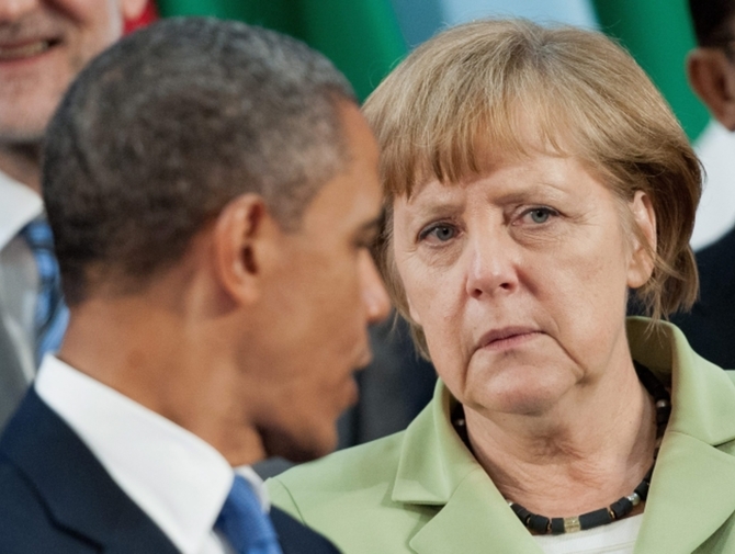 Обама и Меркель договорились привлечь Россию к ответственности за поддержку сепаратистов