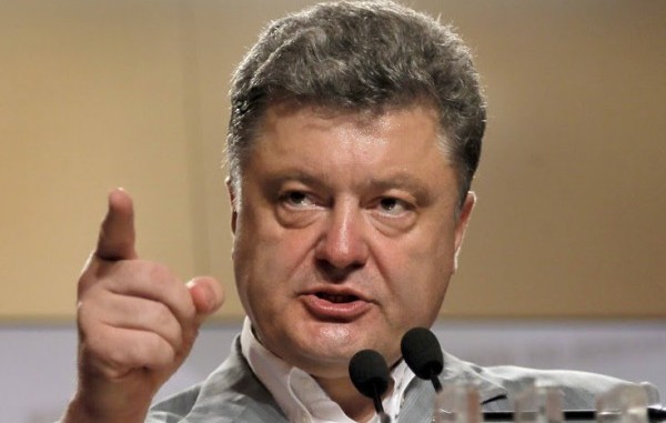 В годовщину крушения МН17 на оккупированном Донбассе Порошенко пообещал наказать Россию за ужасную трагедию