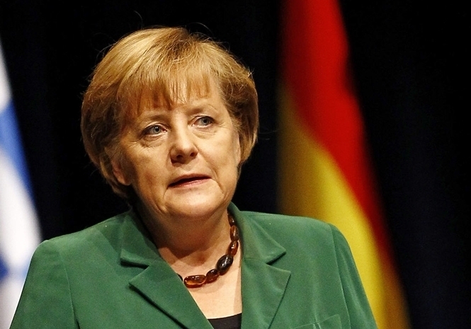 Меркель: "Мирное" падение Берлинской стены - это чудо