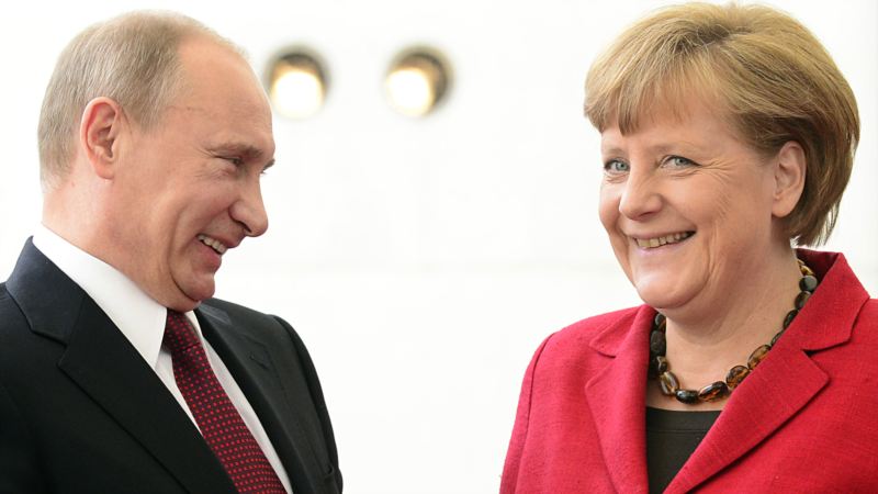 Путин и Меркель поддерживают отсрочку соглашения ЕС-Украина