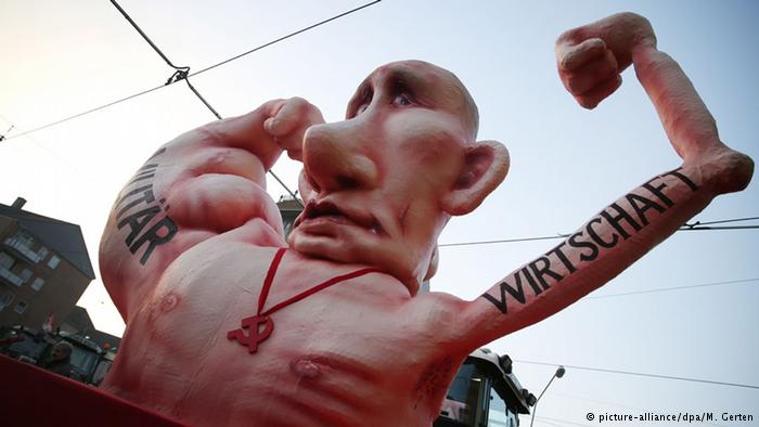 Карнавал в Германии: "высохшая экономика" и "раздутое войско" Путина