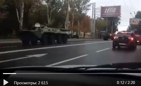 Боевики готовятся наступать: видео переброски колонны российских БТРов через улицу Артема в Донецке - кадры