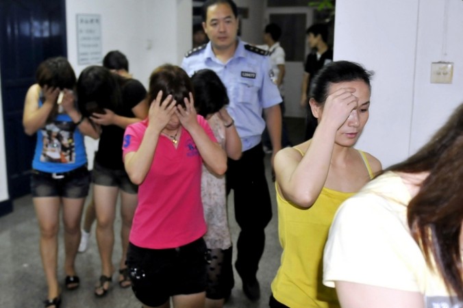 На работу в Китай: два украинца отправляли девушек из Киева в Поднебесную для занятия проституцией