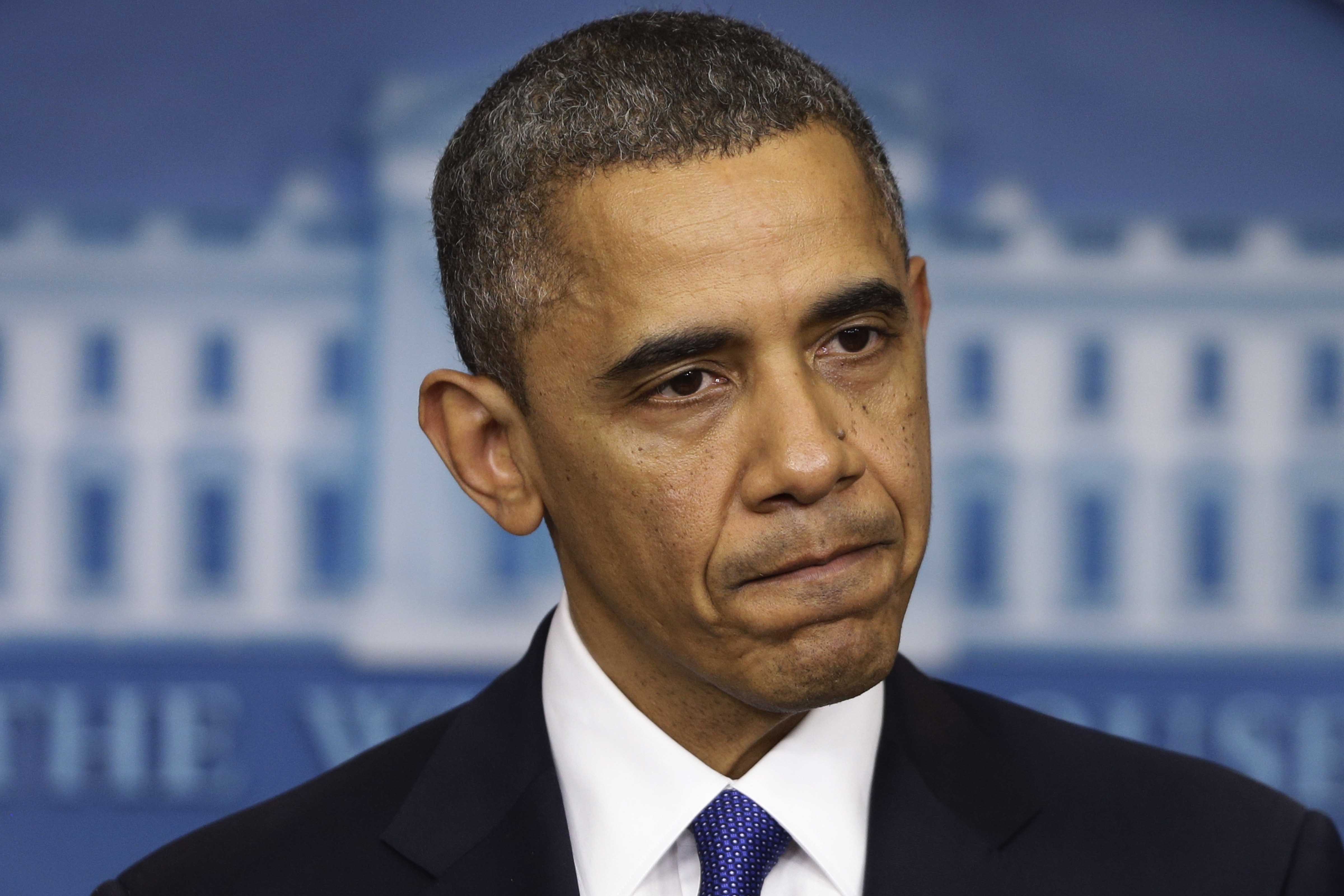 Обама призвал пока не спешить с санкциями против России 