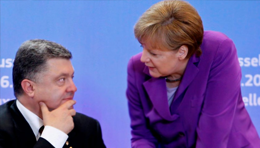 Меркель позвонила Порошенко после первого тура выборов и призналась, что ее поразило больше всего