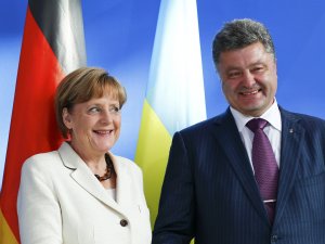 ​Порошенко: Германия выделит 500 млн евро для восстановления Донбасса