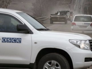 В зоне АТО ОБСЕ был замечен ребенок с оружие и в камуфляже