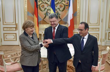 Путин стал новой причиной встречи Олланда, Меркель и Порошенко