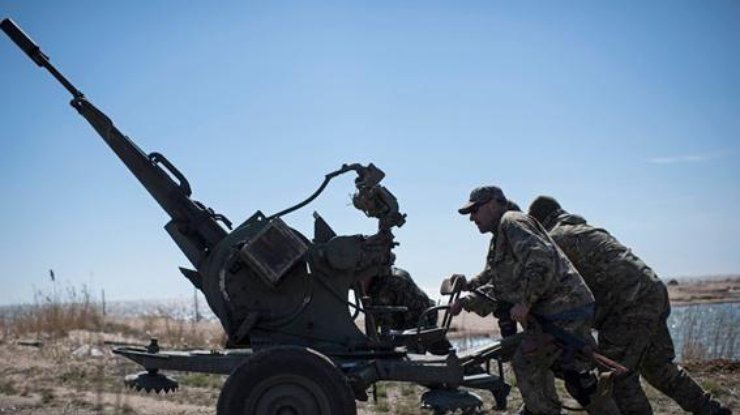 Ночь в АТО: боевики бьют из танков и "отведенной" артиллерии по мирным городам