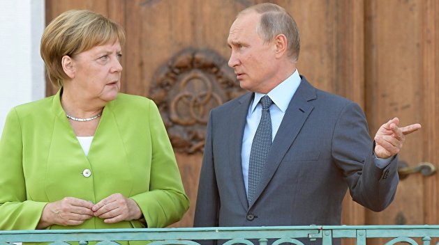 Меркель призвала Путина к встрече в нормандском формате: Путин выдвинул условия